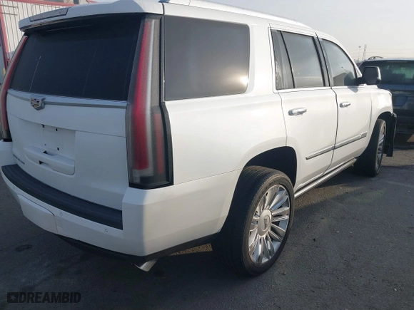 2016 Cadillac Escalade Platinum with VIN 1GYS4DKJ5GR260260, listed as a IAAI auction lot 41476668 with 108,058 mi miles. Bid and sale history available at carsss.com. Image 4.