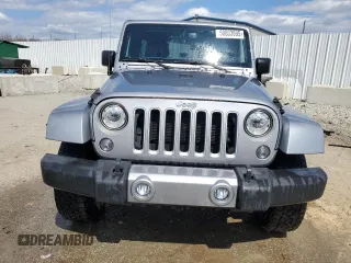 2018 Jeep Wrangler JK Unlimited Sahara with VIN 1C4HJWEG8JL921696, listed as a Copart auction lot 50803695 with 115,729 mi miles and Salvage Title. Bid and sale history available at carsss.com. Image 5.