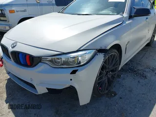 2015 BMW 4 Series 428i xDrive with VIN WBA4C9C54FD330582, listed as a IAAI auction lot 42135691 with 127,289 mi miles and . Bid and sale history available at DreamBid. Image 6.