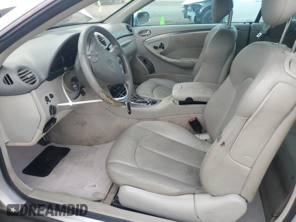 2004 Mercedes-Benz CLK 320 with VIN WDBTK65GX4T017827, listed as a Copart auction lot 71733924 with 139,585 mi miles and Salvage Title. Bid and sale history available at DreamBid. Image 7.