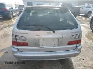 1999 Toyota Corolla с VIN AE1000286393, выставлен на аукционе Copart как лот 42634225 с пробегом 80 160 миль миль и Чистый • Clean title. История ставок и продаж доступна на DreamBid. Изображение 6.