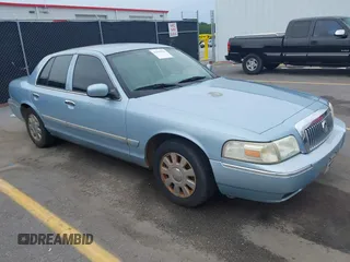 2006 Mercury Grand Marquis LS Premium z VIN 2MEFM75W96X654606, wystawiony jako IAAI lot #42194221 z przebiegiem 155 671 mil mil oraz . Historia ofert i sprzedaży dostępna na DreamBid. Obrazek 1.