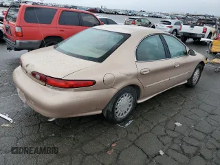 1996 Mercury Sable LS z VIN 1MELM53S0TA607489, wystawiony jako Copart lot #85730734 z przebiegiem 113 214 mil mil oraz Szkody całkowita. Historia ofert i sprzedaży dostępna na DreamBid. Obrazek 3.