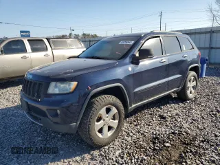 2013 Jeep Grand Cherokee Overland with VIN 1C4RJFCT8DC523252, listed as a Copart auction lot 48706965 with 173,325 mi miles and Salvage Title. Bid and sale history available at carsss.com. Image 1.