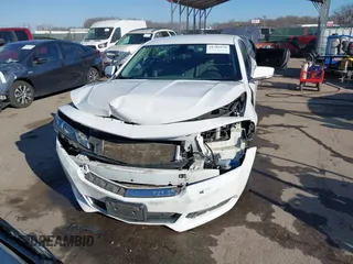 2017 Chevrolet Impala LT with VIN 2G1105S35H9112814, listed as a IAAI auction lot 41703979 with 184,508 mi miles and . Bid and sale history available at DreamBid. Image 13.