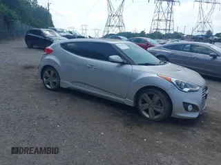 2013 Hyundai Veloster Turbo with VIN KMHTC6AE1DU177023, listed as a IAAI auction lot 42604617 with 102,087 mi miles and . Bid and sale history available at DreamBid. Image 1.