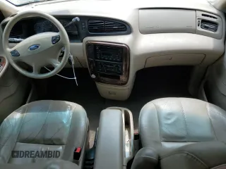 2003 Ford Windstar SEL z VIN 2FMDA53463BA29172, wystawiony jako Copart lot #56416405 z przebiegiem 124 800 mil mil oraz Szkody całkowita. Historia ofert i sprzedaży dostępna na DreamBid. Obrazek 8.