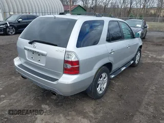 2006 Acura MDX Touring RES w/Navi with VIN 2HNYD18926H511319, listed as a IAAI auction lot 41802256 with 216,637 mi miles. Bid and sale history available at carsss.com. Image 4.