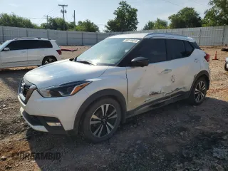 2018 Nissan Kicks SR with VIN 3N1CP5CU4JL541676, listed as a Copart auction lot 60110015 with 122,458 mi miles and Salvage title. Bid and sale history available at DreamBid. Image 1.