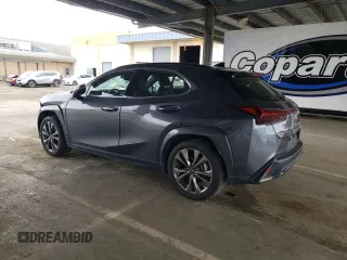 2023 Lexus UX 250h F Sport with VIN JTHB9JBHXP2065586, listed as a Copart auction lot 59037755 with 23,620 mi miles and Salvage title. Bid and sale history available at DreamBid. Image 2.