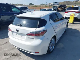 2011 Lexus CT 200h with VIN JTHKD5BH2B2015893, listed as a IAAI auction lot 42095735 with 124,619 mi miles and . Bid and sale history available at DreamBid. Image 4.