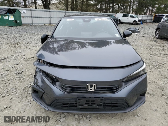 2023 Honda Civic Sport z VIN 2HGFE2F50PH556908, wystawiony jako Copart lot #52789655 z przebiegiem Nie podano mil oraz Szkoda całkowita • Salvage title. Historia ofert i sprzedaży dostępna na DreamBid. Obrazek 5.