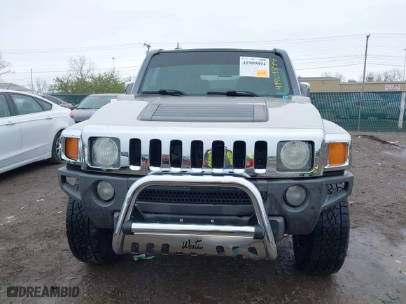 2006 Hummer H3 with VIN 5GTDN136168100264, listed as a IAAI auction lot 41909894 with 136,284 mi miles. Bid and sale history available at carsss.com. Image 12.