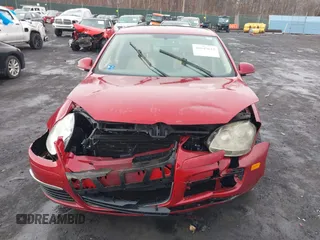2006 Volkswagen Jetta 2.5L z VIN 3VWSF71KX6M681223, wystawiony jako IAAI lot #41645643 z przebiegiem 72 631 mil mil oraz . Historia ofert i sprzedaży dostępna na DreamBid. Obrazek 12.