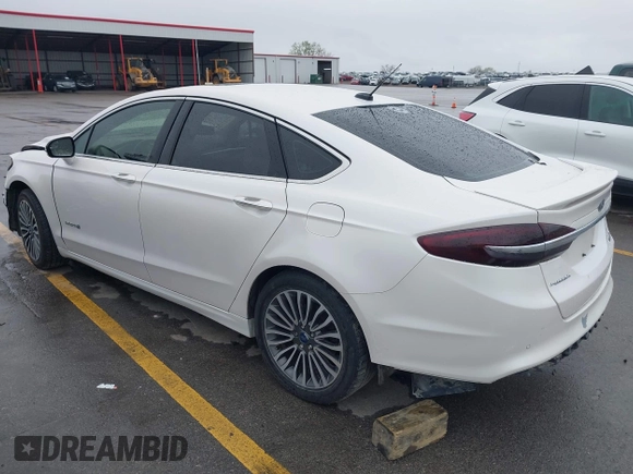 2017 Ford Fusion Hybrid Titanium с VIN 3FA6P0RUXHR317572, выставлен на аукционе IAAI как лот 42170169 с пробегом 138 987 миль миль и . История ставок и продаж доступна на DreamBid. Изображение 3.