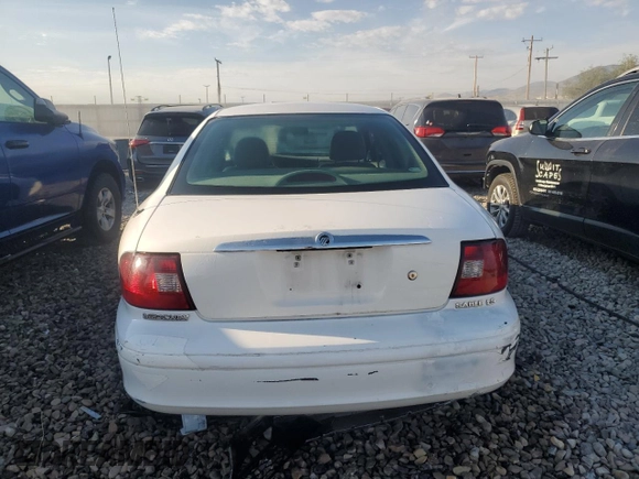 2000 Mercury Sable z VIN 1MEFM53U7YG640279, wystawiony jako Copart lot #70701264 z przebiegiem 118 790 mil mil oraz Szkoda całkowita • Salvage title. Historia ofert i sprzedaży dostępna na DreamBid. Obrazek 6.