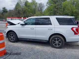 2019 Ford Expedition XLT with VIN 1FMJU1JT0KEA72504, listed as a IAAI auction lot 42123316 with 118,906 mi miles and . Bid and sale history available at DreamBid. Image 14.
