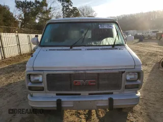 1992 GMC Vandura z VIN 2GTGG39KXN4515226, wystawiony jako Copart lot #85211254 z przebiegiem 594 809 mil mil oraz Szkody całkowita. Historia ofert i sprzedaży dostępna na DreamBid. Obrazek 5.