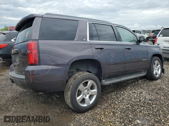 2015 Chevrolet Tahoe LT with VIN 1GNSCBKC3FR282603, listed as a Copart auction lot 50191155 with 219,272 mi miles and Salvage Title. Bid and sale history available at DreamBid. Image 3.