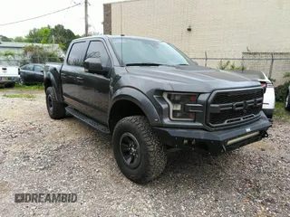 2017 Ford F-150 Raptor with VIN 1FTFW1RG8HFA31164, listed as a IAAI auction lot 42125542 with 164,745 mi miles and . Bid and sale history available at carsss.com. Image 1.