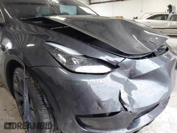 2024 Tesla Model Y Performance with VIN 7SAYGDEFXRF049338, listed as a IAAI auction lot 41240812 with 10,132 mi miles and . Bid and sale history available at DreamBid. Image 6.
