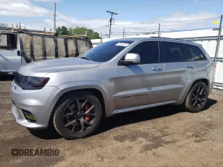 2017 Jeep Grand Cherokee SRT z VIN 1C4RJFDJ1HC914004, wystawiony jako Copart lot #57082055 z przebiegiem 47 473 mil mil oraz Szkoda całkowita • Salvage title. Historia ofert i sprzedaży dostępna na DreamBid. Obrazek 1.