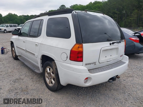 2003 GMC Envoy SLT with VIN 1GKES16S936189719, listed as a IAAI auction lot 42122292 with 289,810 mi miles and . Bid and sale history available at DreamBid. Image 3.