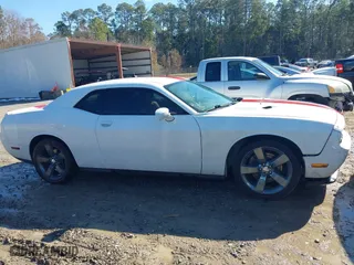 2013 Dodge Challenger SXT with VIN 2C3CDYAG2DH510772, listed as a IAAI auction lot 41417597 with 131,087 mi miles. Bid and sale history available at carsss.com. Image 13.