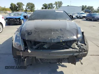 2013 Cadillac CTS-V z VIN 1G6DV1EP1D0102981, wystawiony jako Copart lot #61349404 z przebiegiem 59 386 mil mil oraz Szkody całkowita. Historia ofert i sprzedaży dostępna na DreamBid. Obrazek 5.