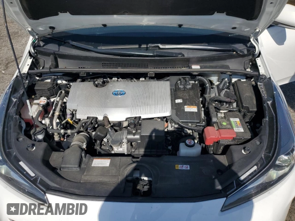 2021 Toyota Prius L Eco z VIN JTDKAMFU4M3145800, wystawiony jako Copart lot #59180285 z przebiegiem 33 991 mil mil oraz Czysty tytuł • Clean title. Historia ofert i sprzedaży dostępna na DreamBid. Obrazek 11.