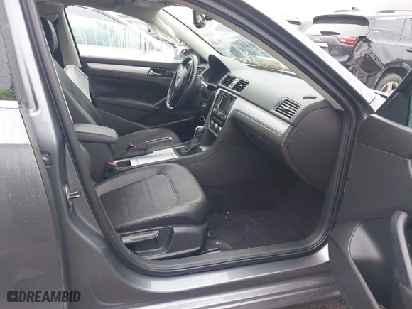 2012 Volkswagen Passat SE with VIN 1VWBP7A37CC011521, listed as a IAAI auction lot 41876767 with 125,543 mi miles. Bid and sale history available at carsss.com. Image 5.