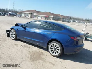 2022 Tesla Model 3 Long Range with VIN 5YJ3E1EB0NF191717, listed as a IAAI auction lot 41722202 with 67,811 mi miles. Bid and sale history available at carsss.com. Image 3.