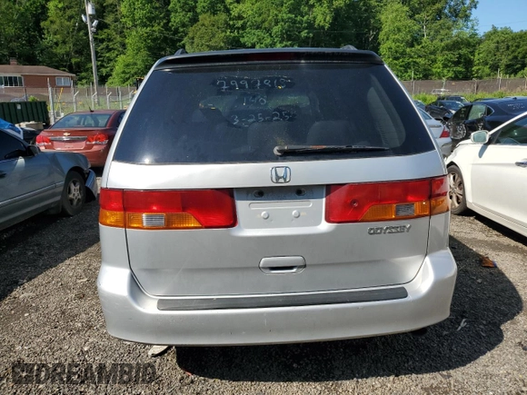 2003 Honda Odyssey EX-L z VIN 5FNRL18903B007639, wystawiony jako Copart lot #57230975 z przebiegiem 189 235 mil mil oraz Szkoda całkowita • Salvage title. Historia ofert i sprzedaży dostępna na DreamBid. Obrazek 6.
