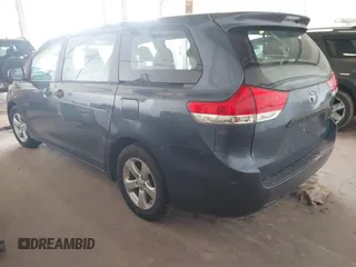 2014 Toyota Sienna L with VIN 5TDZK3DCXES434910, listed as a IAAI auction lot 41731864 with 146,161 mi miles. Bid and sale history available at carsss.com. Image 3.