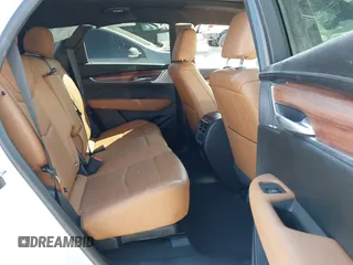 2023 Cadillac XT5 AWD Premium Luxury with VIN 1GYKNDRS4PZ195431, listed as a IAAI auction lot 41714459 with 13,207 mi miles and . Bid and sale history available at DreamBid. Image 8.