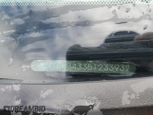 2005 Mazda 3 s with VIN JM1BK343351233932, listed as a Copart auction lot 51490275 with 211,731 mi miles and Salvage Title. Bid and sale history available at carsss.com. Image 12.