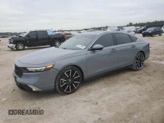 2025 Honda Accord Touring with VIN 1HGCY2F81SA001588, listed as a Copart auction lot 88773825 with 4,899 mi miles and Salvage title. Bid and sale history available at DreamBid. Image 1.