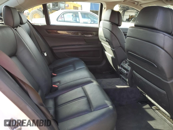2011 BMW 7 Series 740Li with VIN WBAKB4C58BC573888, listed as a Copart auction lot 78736874 with 76,832 mi miles and Salvage Title. Bid and sale history available at DreamBid. Image 10.