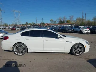 2016 BMW 6 Series 640i xDrive with VIN WBA6D2C51GGT66209, listed as a IAAI auction lot 42064405 with 113,500 mi miles and . Bid and sale history available at carsss.com. Image 14.