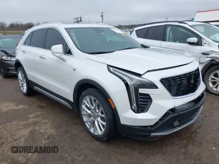 2022 Cadillac XT4 FWD Premium Luxury with VIN 1GYFZCR42NF124440, listed as a IAAI auction lot 41183073 with 47,763 mi miles. Bid and sale history available at carsss.com. Image 1.