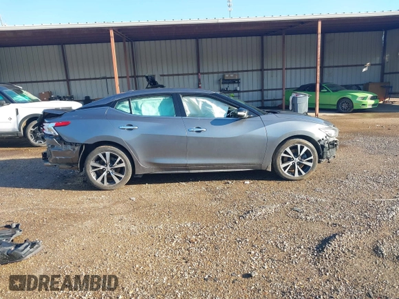 2016 Nissan Maxima SV z VIN 1N4AA6APXGC386974, wystawiony jako IAAI lot #41738932 z przebiegiem 132 395 mil mil oraz . Historia ofert i sprzedaży dostępna na DreamBid. Obrazek 14.
