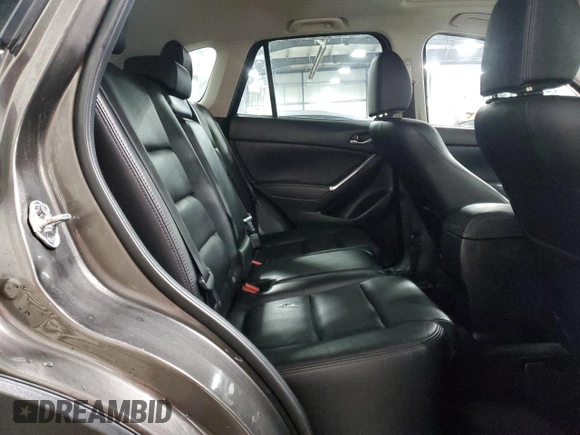 2016 Mazda CX-5 Grand Touring with VIN JM3KE4DY4G0600877, listed as a Copart auction lot 85560194 with 82,395 mi miles and Salvage Title. Bid and sale history available at carsss.com. Image 11.