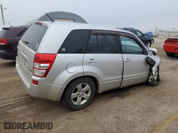 2012 Suzuki Grand Vitara Premium z VIN JS3TD0D66C4100621, wystawiony jako Copart lot #86968164 z przebiegiem Nie podano mil oraz Szkody całkowita. Historia ofert i sprzedaży dostępna na DreamBid. Obrazek 3.