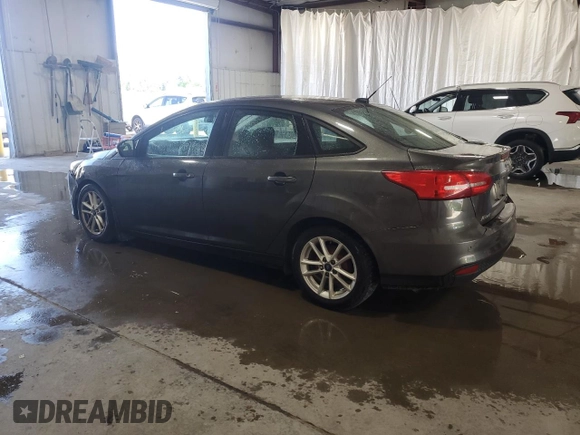 2015 Ford Focus SE with VIN 1FADP3F29FL310622, listed as a Copart auction lot 63591065 with 119,957 mi miles and Salvage title. Bid and sale history available at DreamBid. Image 2.