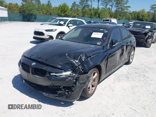 2013 BMW 3 Series 328i with VIN WBA3C1C57DF434854, listed as a IAAI auction lot 42023257 with 125,960 mi miles and . Bid and sale history available at carsss.com. Image 2.
