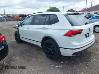 2024 Volkswagen Tiguan SE R-Line Black with VIN 3VV8B7AX3RM111526, listed as a IAAI auction lot 42524100 with 7,280 mi miles and . Bid and sale history available at DreamBid. Image 3.