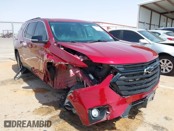 2021 Chevrolet Traverse LT with VIN 1GNERHKW9MJ117918, listed as a IAAI auction lot 42470808 with 77,535 mi miles and . Bid and sale history available at DreamBid. Image 6.
