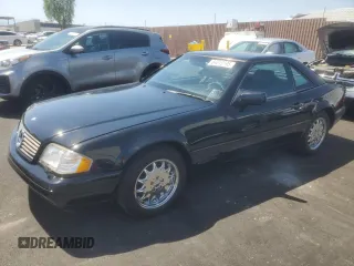1996 Mercedes-Benz SL 320 with VIN WDBFA63F4TF130390, listed as a Copart auction lot 64619595 with 79,437 mi miles and Clean title. Bid and sale history available at DreamBid. Image 1.