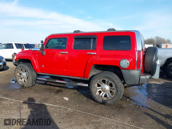 2009 Hummer H3 SUV Alpha with VIN 5GTEN13L398145561, listed as a IAAI auction lot 41232458 with 153,543 mi miles. Bid and sale history available at carsss.com. Image 14.