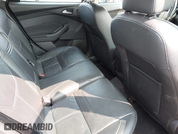 2016 Ford Focus Titanium with VIN 1FADP3N26GL206866, listed as a IAAI auction lot 42403015 with 95,753 mi miles and . Bid and sale history available at DreamBid. Image 8.